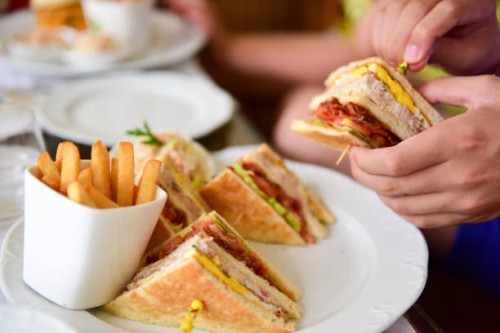 club sandwiches, french fries and coleslaw - junk food stock pictures, royalty-free photos & images