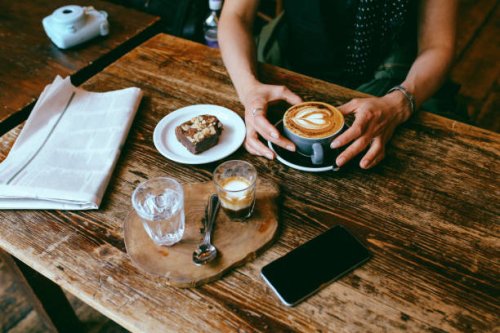 coffee and cake on the table in a cafe in london downtown - coffee stock pictures, royalty-free photos & images