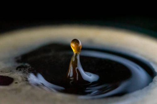coffee droplet splashing - coffee stock pictures, royalty-free photos & images