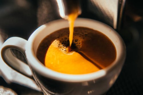 coffee machine pouring out espresso shot. - coffee stock pictures, royalty-free photos & images