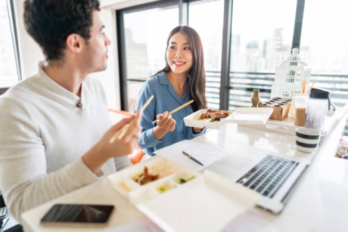 collaboration in business and lunch - junk food stock pictures, royalty-free photos & images