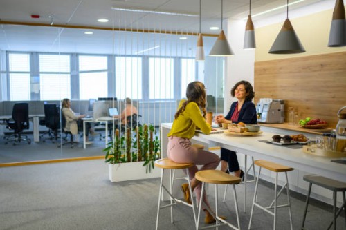 colleagues talking in office - food stock pictures, royalty-free photos & images