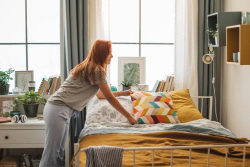 college student at dorm room - home decoration stock pictures, royalty-free photos & images