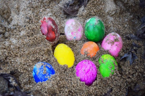 colorful easter eggs in nest on meadow - garden decoration stock pictures, royalty-free photos & images
