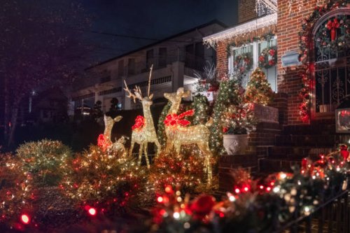 colorful illuminated christmas decoration in front yards in brooklyn, new york - garden decoration stock pictures, royalty-free photos & images