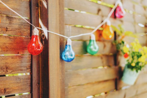 colorful string lights for party decoration - garden decoration stock pictures, royalty-free photos & images