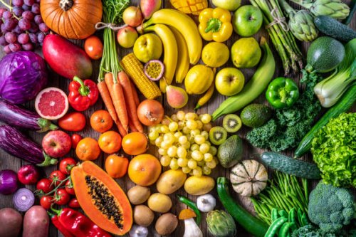 colorful vegetables and fruits vegan food in rainbow colors - food stock pictures, royalty-free photos & images