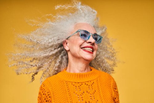 colourful studio portrait of a senior woman - hairstyle stockfoto's en -beelden