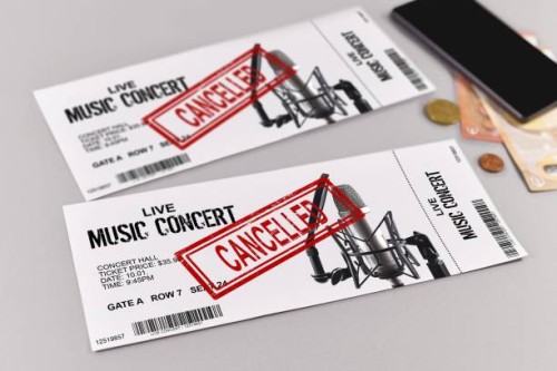 concept for cancelled entertainment events with concert tickets and red cancelled stamp on them - concert stock pictures, royalty-free photos & images