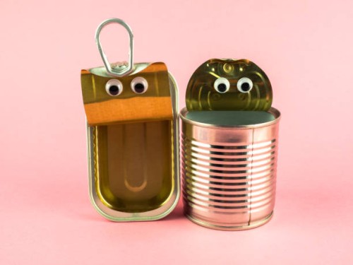 concept of love, romanticism and diversity. two open tin cans with eyes - food stock pictures, royalty-free photos & images