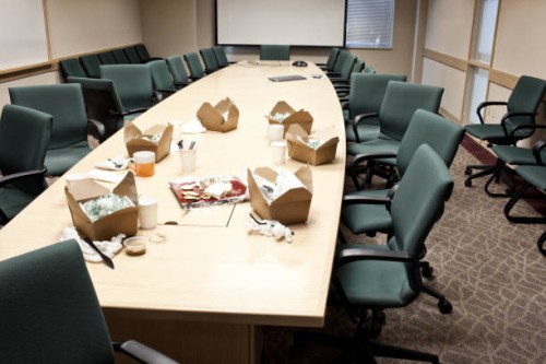 conference room table with take out lunches - junk food stock pictures, royalty-free photos & images
