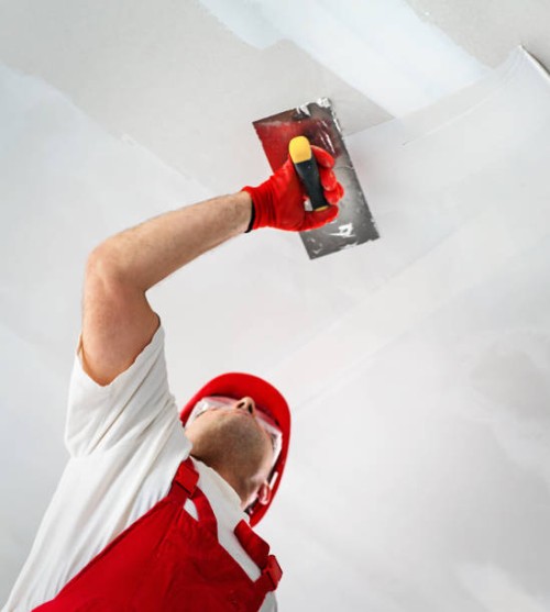 construction worker during interior decoration. - home decoration stock pictures, royalty-free photos & images