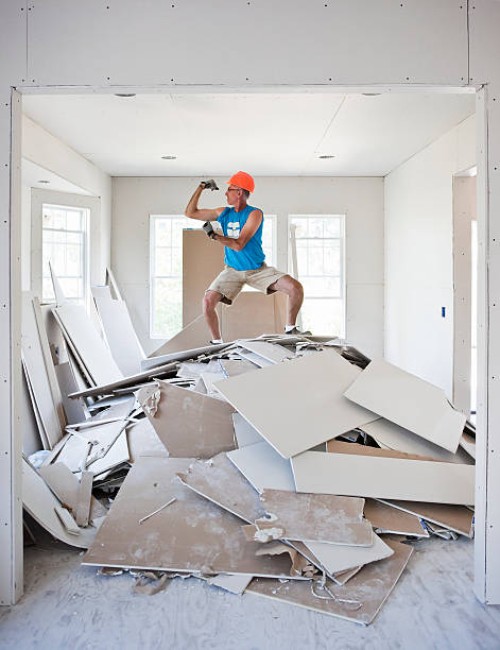 construction worker flexing bicep - home decoration stock pictures, royalty-free photos & images