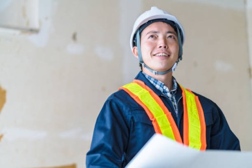 construction worker reading blueprints - home decoration stock pictures, royalty-free photos & images