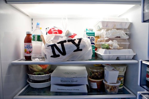 Containers of take-out food fill refrigerator shelves inside the apartment of Marc Dreier, founder of the law firm Dreier LLP sentenced to 20 years...