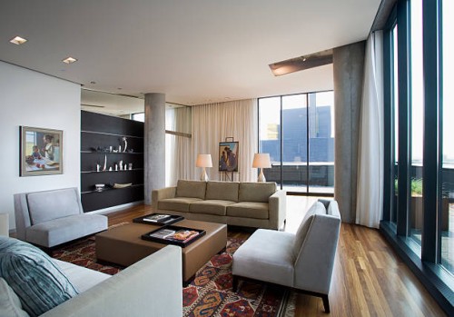 contemporary living room in loft condominium - home decoration stock pictures, royalty-free photos & images