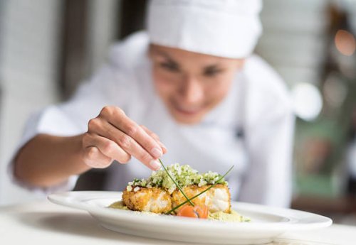 cook decorating a plate - food stock pictures, royalty-free photos & images