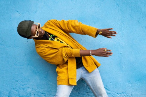 cool guy with his head on one side and his hands - fashion stock pictures, royalty-free photos & images