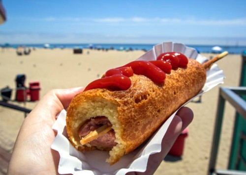 corn dog at santa cruz beach, california - junk food stock pictures, royalty-free photos & images