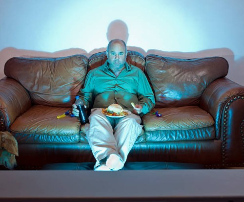 couch potato - junk food stock pictures, royalty-free photos & images