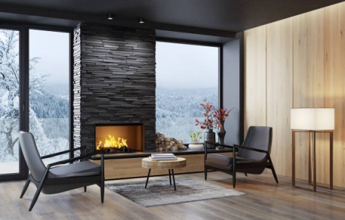 country villa modern interior living room area with fireplace and black slate stone chimney. - home decoration stock pictures, royalty-free photos & images