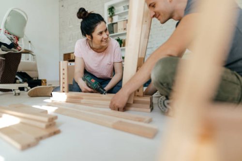 couple assembling furniture together - home decoration stock pictures, royalty-free photos & images