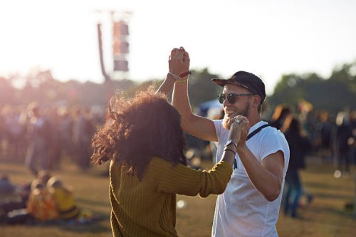couple dancing at music festival - concert stock pictures, royalty-free photos & images