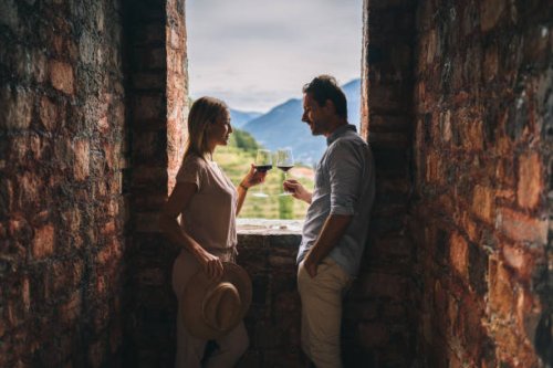couple enjoy some red wine in ancient italian castle - travel stock pictures, royalty-free photos & images