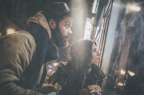 couple looking at the shop window - junk food stock pictures, royalty-free photos & images