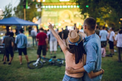 couple making selfie on a music festival - concert stock pictures, royalty-free photos & images