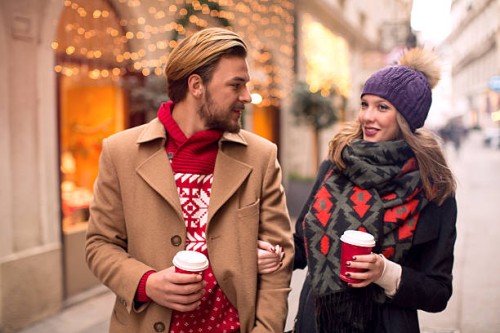 couple outdoors in winter city. - junk food stock pictures, royalty-free photos & images