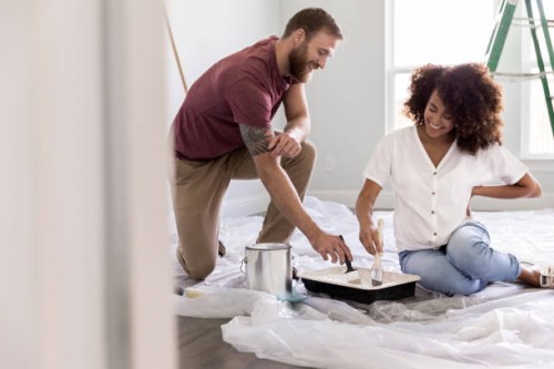 couple paint room together - home decoration stock pictures, royalty-free photos & images