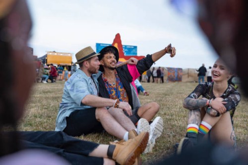 couple taking a selfie at festival - concert stock pictures, royalty-free photos & images