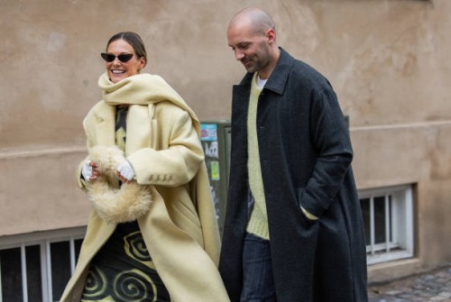 Couple Tin Vcb wears beige coat, dress, white Chanel gloves outside Lovechild 1979 during the Copenhagen Fashion Week AW24 on January 30, 2024 in...