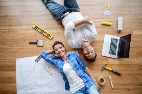 couple working on a housing project - home decoration stock pictures, royalty-free photos & images