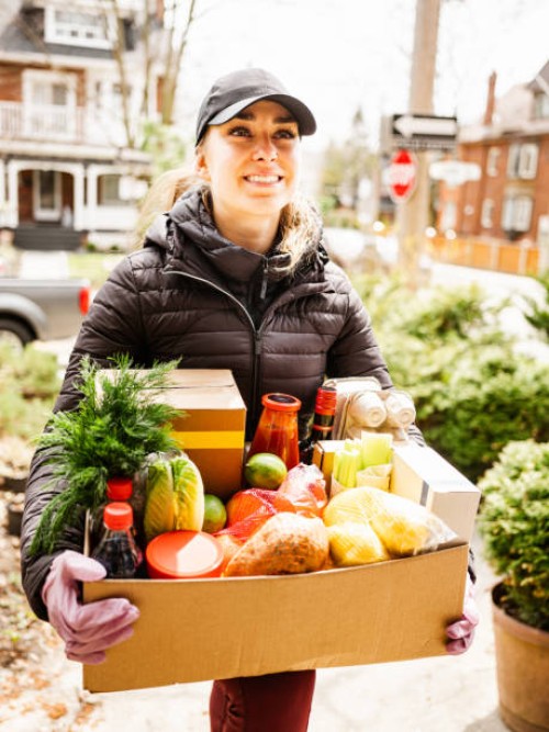 covid-19, home food delivery during lockdown - junk food stock pictures, royalty-free photos & images