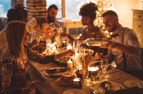 cozy new year dinner among friends - food stock pictures, royalty-free photos & images