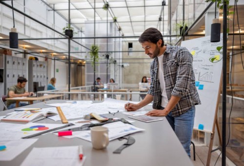 creative business man working at a coworking space - fashion stock pictures, royalty-free photos & images