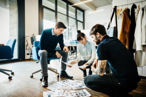 creative new business people brainstorming in modern office loft - fashion stock pictures, royalty-free photos & images