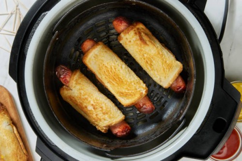 crispy air fried grilled cheese hot dog rolls - junk food stock pictures, royalty-free photos & images