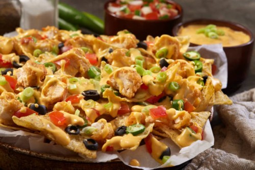 crispy chicken tender nachos - junk food stock pictures, royalty-free photos & images