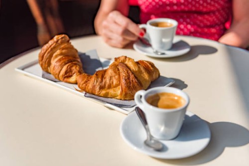 croissants and coffee - a typical parisian breakfast - food stock pictures, royalty-free photos & images