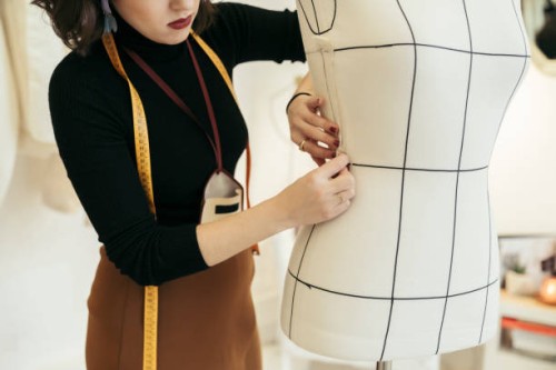 crop view of fashion designer at work - fashion stock pictures, royalty-free photos & images