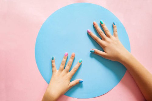 crop woman showing colorful nails in studio - nails art stock pictures, royalty-free photos & images