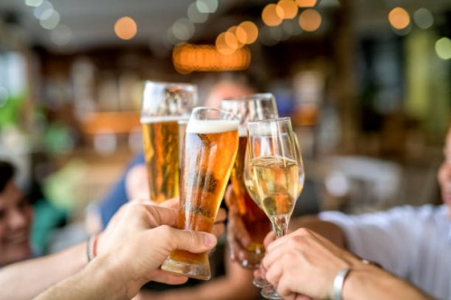 cropped image of friends toasting drinks in celebration. - food stock pictures, royalty-free photos & images