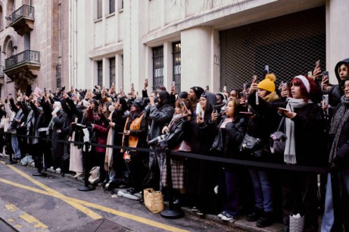 Crowd gathers outside the Paul Smith Fall/Winter 2025 show during Paris Men's Fashion Week in Paris, France, on January 22, 2025. The event attracted...