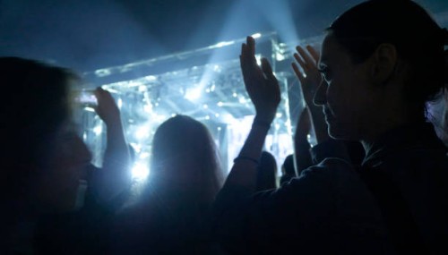 crowd of people at music festival dancing and enjoying music - concert stock pictures, royalty-free photos & images