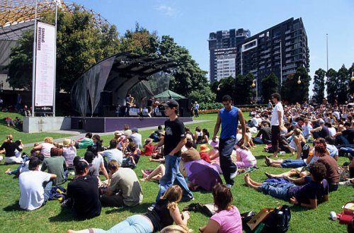 crowd watching free sunday concert - concert stock pictures, royalty-free photos & images