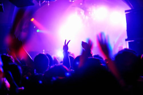 crowd with arms in air at nightclub music. - concert stock pictures, royalty-free photos & images