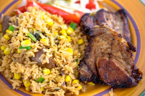 cuban cuisine: deep pork fried and yellow rice - food stock pictures, royalty-free photos & images